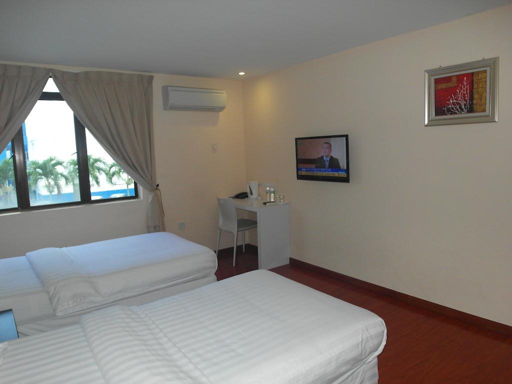 Mcity Inn Miri Pokoj fotografie