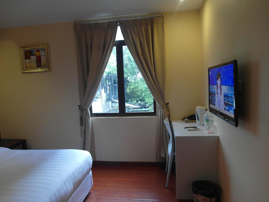 Mcity Inn Miri Pokoj fotografie